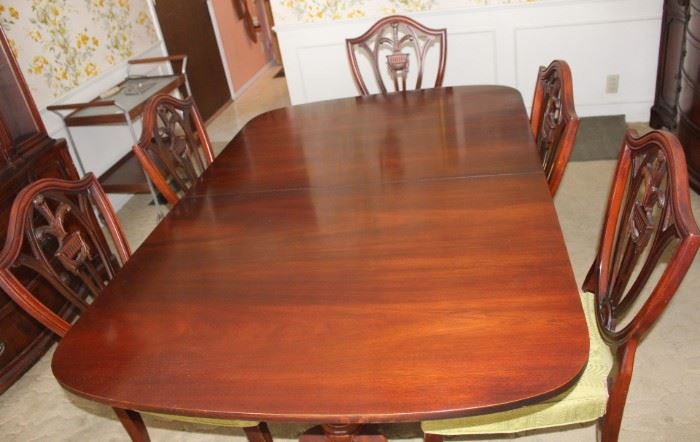 Mahogany table, chairs and leaves.  