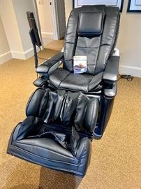 Electric massage chair by Inada.