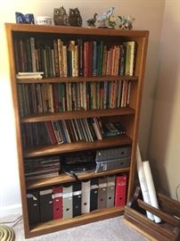 nice oak book case, lots of religious books and magazines