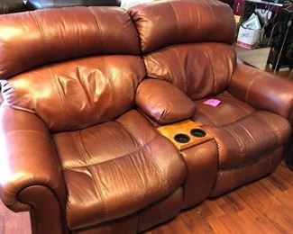 Comfortable brown leather love seat!
