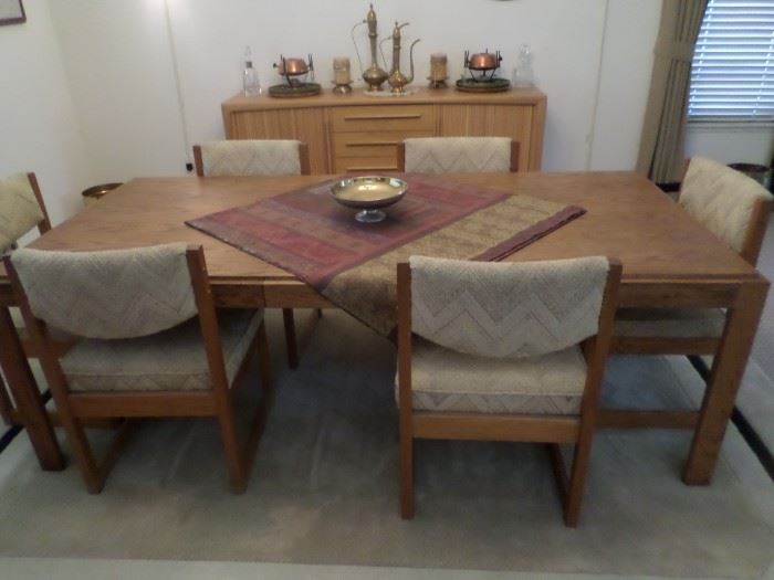 Solid Oak Dining Set-2 leaves-8 chairs.  Opens to seat  10-12 people
