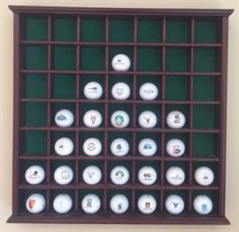Golf Balls and Display Cabinet
