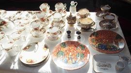 Table full of China inc. Versace Plates, Limoges, Capodimonte, Royal Albert Country Roses Service for 6