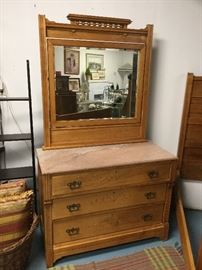 Eastlake spoon carved dresser with tilt beveled mirror with marble top 