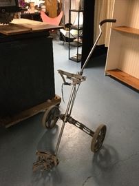 Vintage Bag Boy golf bag carrier. 