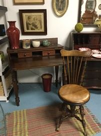 Antique piano desk. Charles Parker high back chair. Chair has glass ball and claw feet.