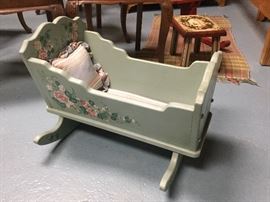 Vintage hand decorated doll cradle. Local artist.