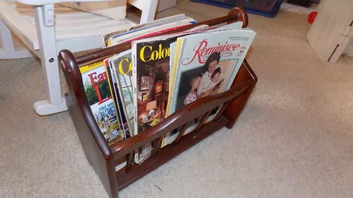 old magazines and wooden rack