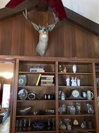 DEER HEAD (TAXIDERMY) W/BOOKCASES STOCKED WITH: WEDGEWOOD, CRYSTAL, CLOCKS, ROSENTHAL...