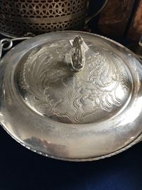 stamped silver covered dish.