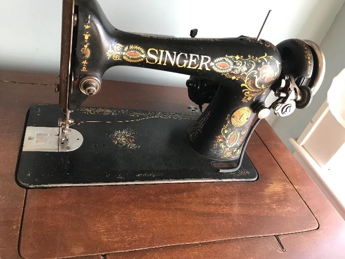Wonderful Singer Sewing Machine in cabinet - swing out door