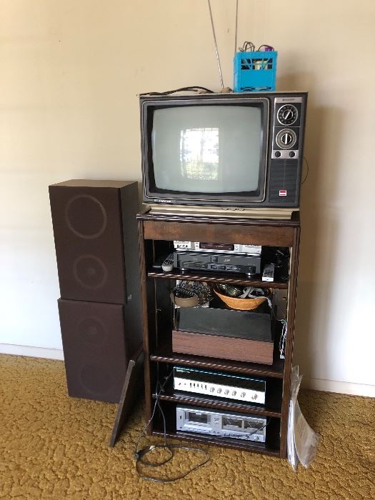Stereo cabinet 24 3/4" W x 18" D x 41" T $35, TV (works) $15, VCR $5, DVD Player $5,  Vintage Stereo System (3 components and 2 speakers) $75