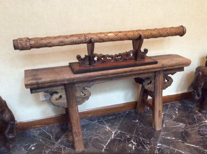 Beautiful rain stick and antique bench