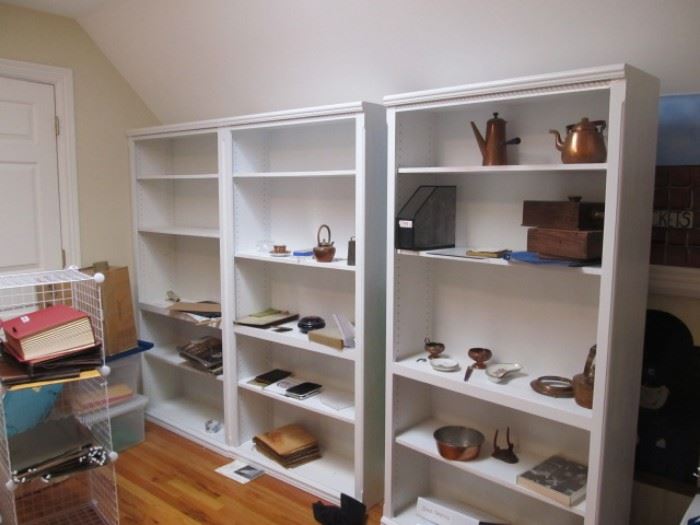 3 of 4 white bookcases