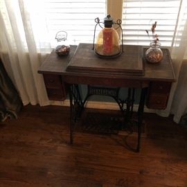 Antique Singer sewing machine with all the “stuff”