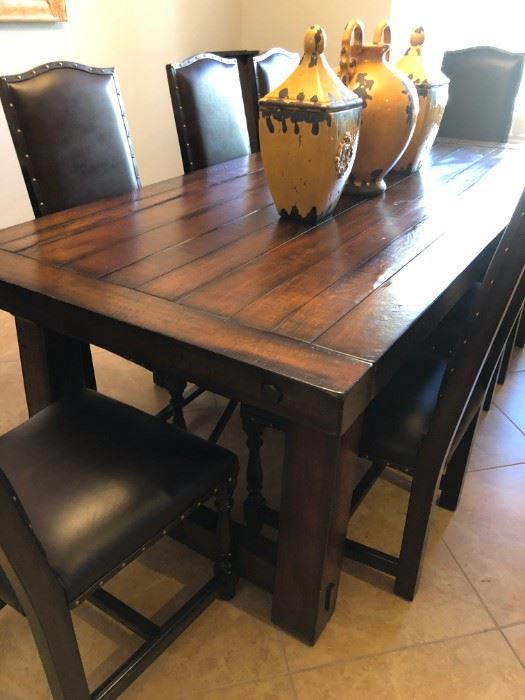 Solid wood, very large dining table with 2 leaves and 8 chairs