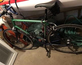 it is a Serotta, with steel frame and carbon fiber front and rear struts and typical road bike dropped handlebars. Components (aka drive train or derailleur) are “Campagnola” brand, 18 speed (2 front sprockets, 9 rear). Color is green and blue for the frame, black for the struts. No dings or dents, never been in any kind of mishap and maintained in good condition with annual servicing. Standard brake pads (i.e not disc brakes) brake and shifting controls on the handlebars. Clip pedals. It’s 56 centimeters and owner is 6’ tall