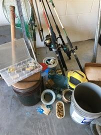 12 Fishing poles  and miscellaneous equipment