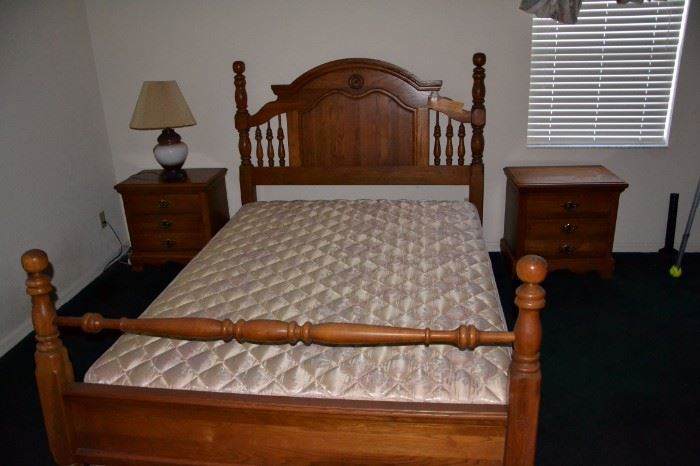 Solid wood full bedroom set, headboard, footboard, two end tables, dresser with mirror and tall men's dresser.