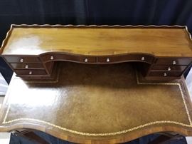 leather top of mahogany writing table