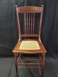 Pressed back oak chair
