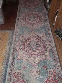 Lots of colorful rugs