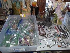 There are rings, bracelets, necklaces, earrings, pins, watches