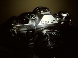 Several 35 mm cameras, access, and digital cameras