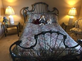 Check out this incredible green wrought iron bed with matching night stands!
