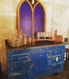 Industrial work bench and stained glass out of church in Atlanta