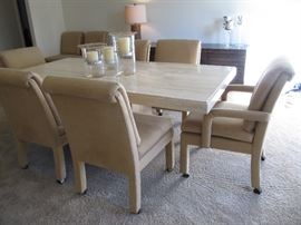 Statement stone dining table with eight chairs - bring your muscle!