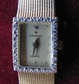 Movado quartz 14k and diamond watch