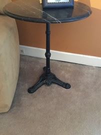 Iron base marble top table $275