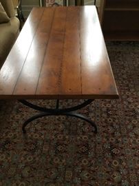 Iron base wooden coffee table $350