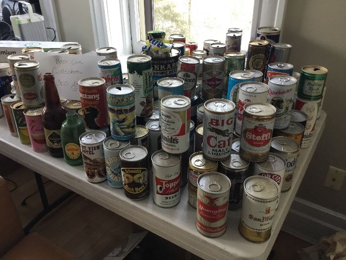 Vintage beer can collection as well as beer bottles only a portion pictured here    $350 all or best offer