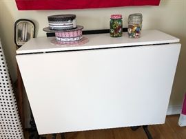 Sewing table and clip-on lamp