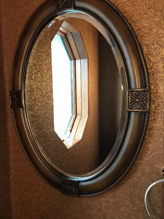 Oval beveled mirror.  One of several mirrors