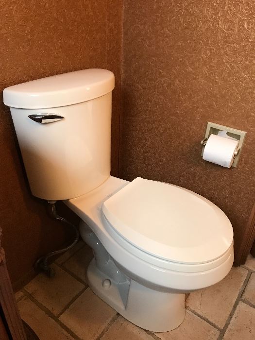 1 of 4 white toilets ...like new!