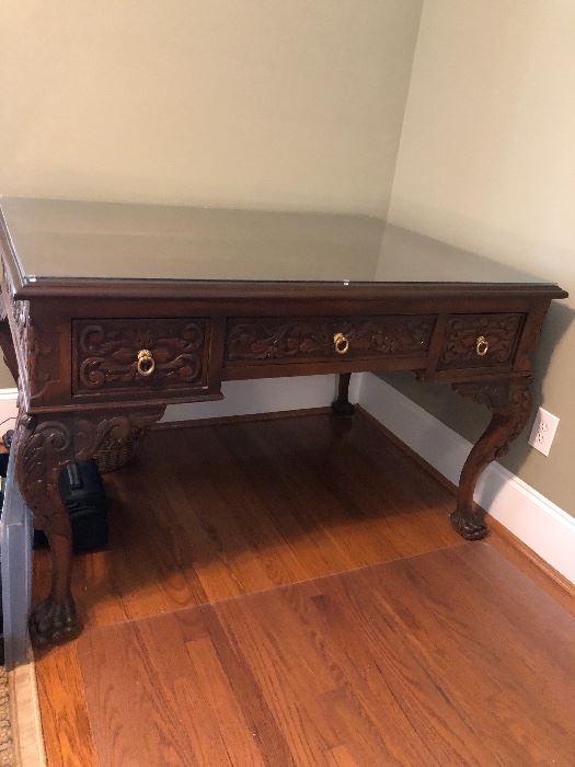RJ Horton antique desk from early 1900's.  Includes protective glass top.  Measures 37 1/4 x 52 x 29 1/2.