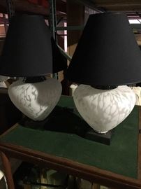Murano mottled white glass table lamps on dark metal bases. Great condition