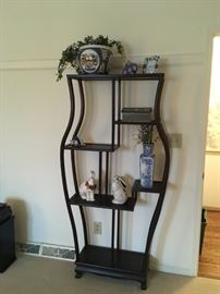 There are 2 of these nice contemporary shelves