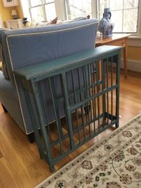 interesting little sofa table,  would make a great hallway piece too.