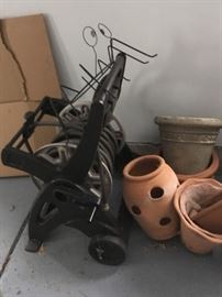 Hose reel, and lots of plant pots