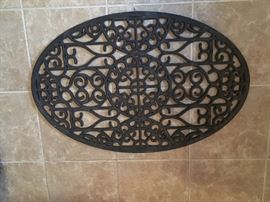 There are 2 of these large rubber door mats.  Nice heavy weight