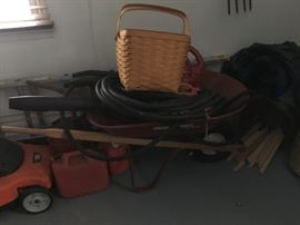 Yep  a buried wheel barrow...Spring WILL COME BACK