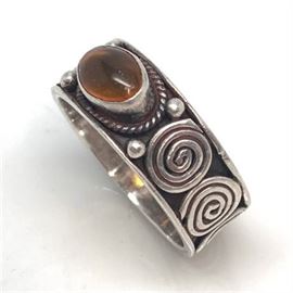Lot 91
Sterling Silver Signed Amber Cabochon Ring