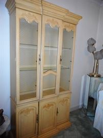 Vintage Country French Sleek Pale Yellow Curio Cabinet with Brass Lattice. Storage. Glass Shelves