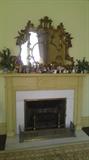 Ornately carved mirror is breathtaking. Over 100 years old. Very nice piece.