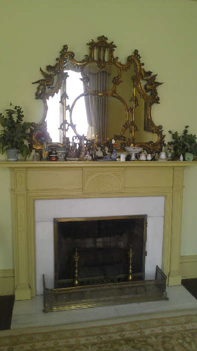 Ornately carved mirror is breathtaking.  Over 100 years old.  Very nice piece.