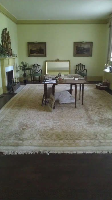 View of living room with large handknotted rug, 2 mirrors, Henry Cooper paintings, Gate Leg table and more....